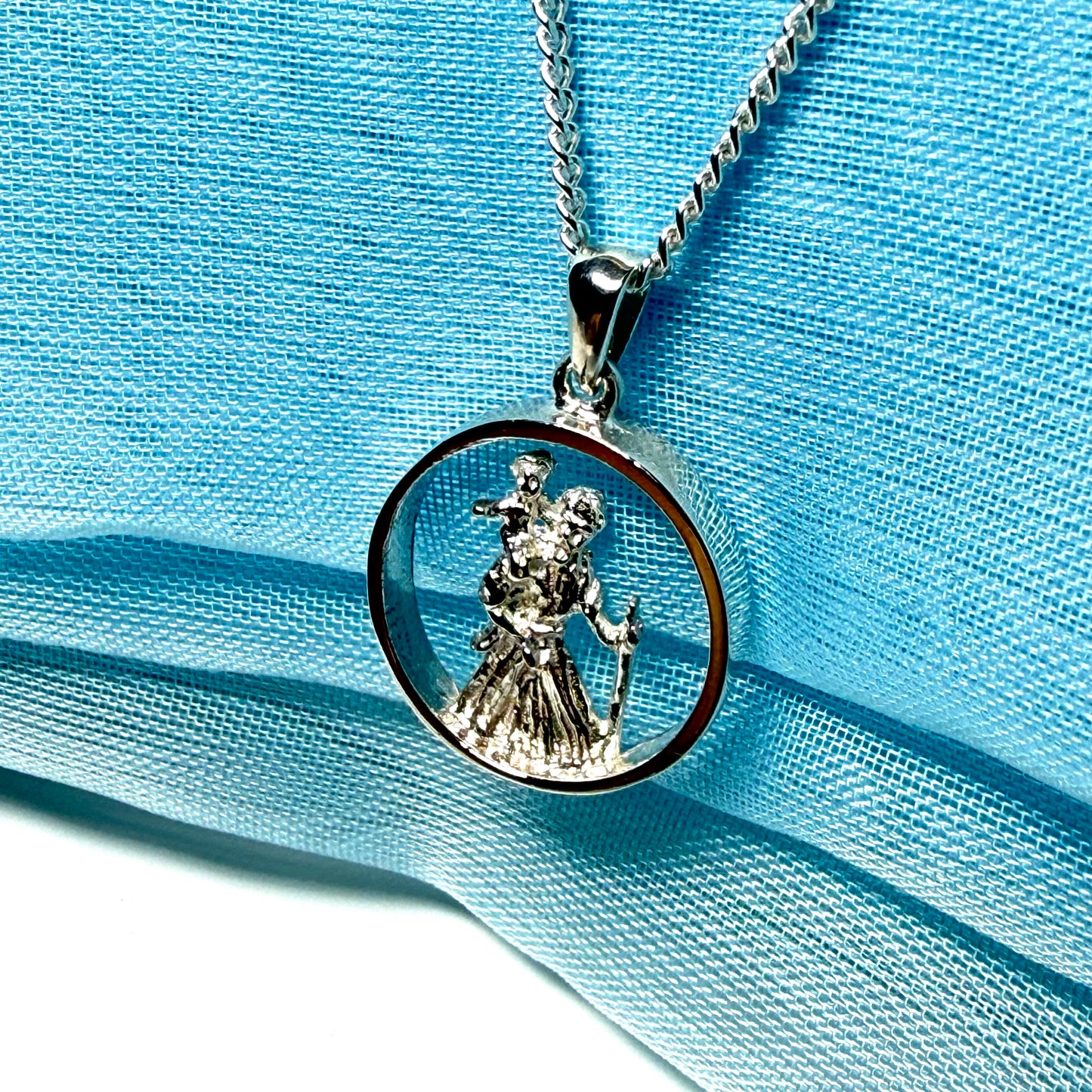 Round sterling silver St. Christopher including chain