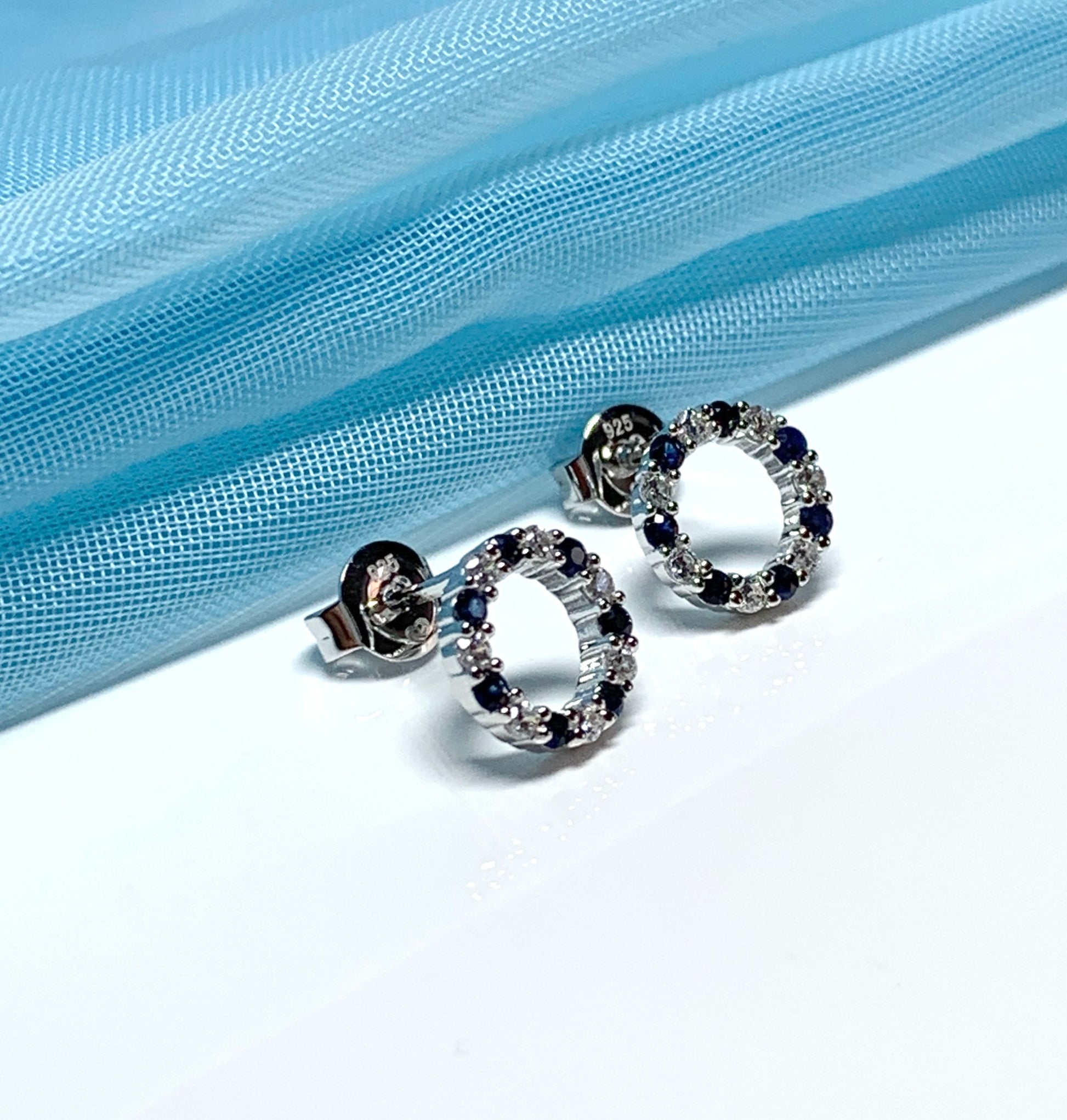 Round blue real sapphire and cubic zirconia sterling silver stud earrings