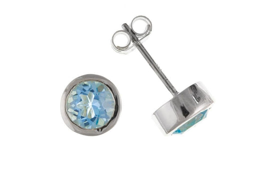 Round blue topaz sterling silver stud earrings with a rub over smooth setting