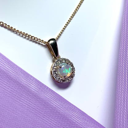 Round opal and diamond yellow gold cluster necklace