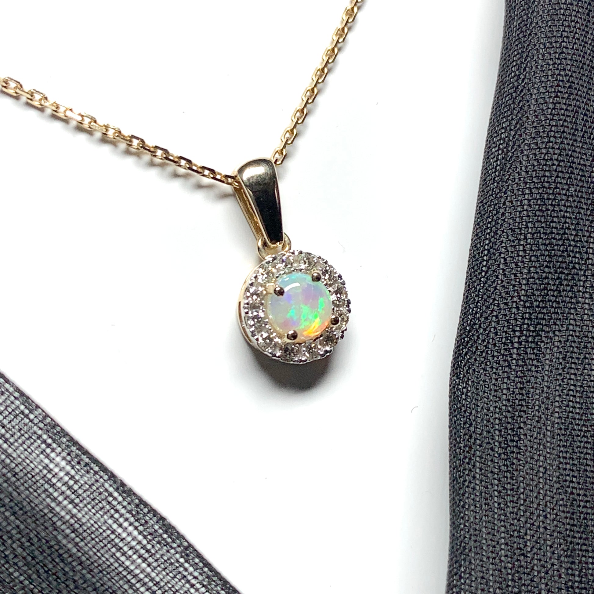 Round opal and diamond yellow gold cluster necklace