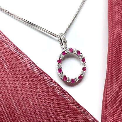 Round red ruby and cubic zirconia sterling silver necklace pendent