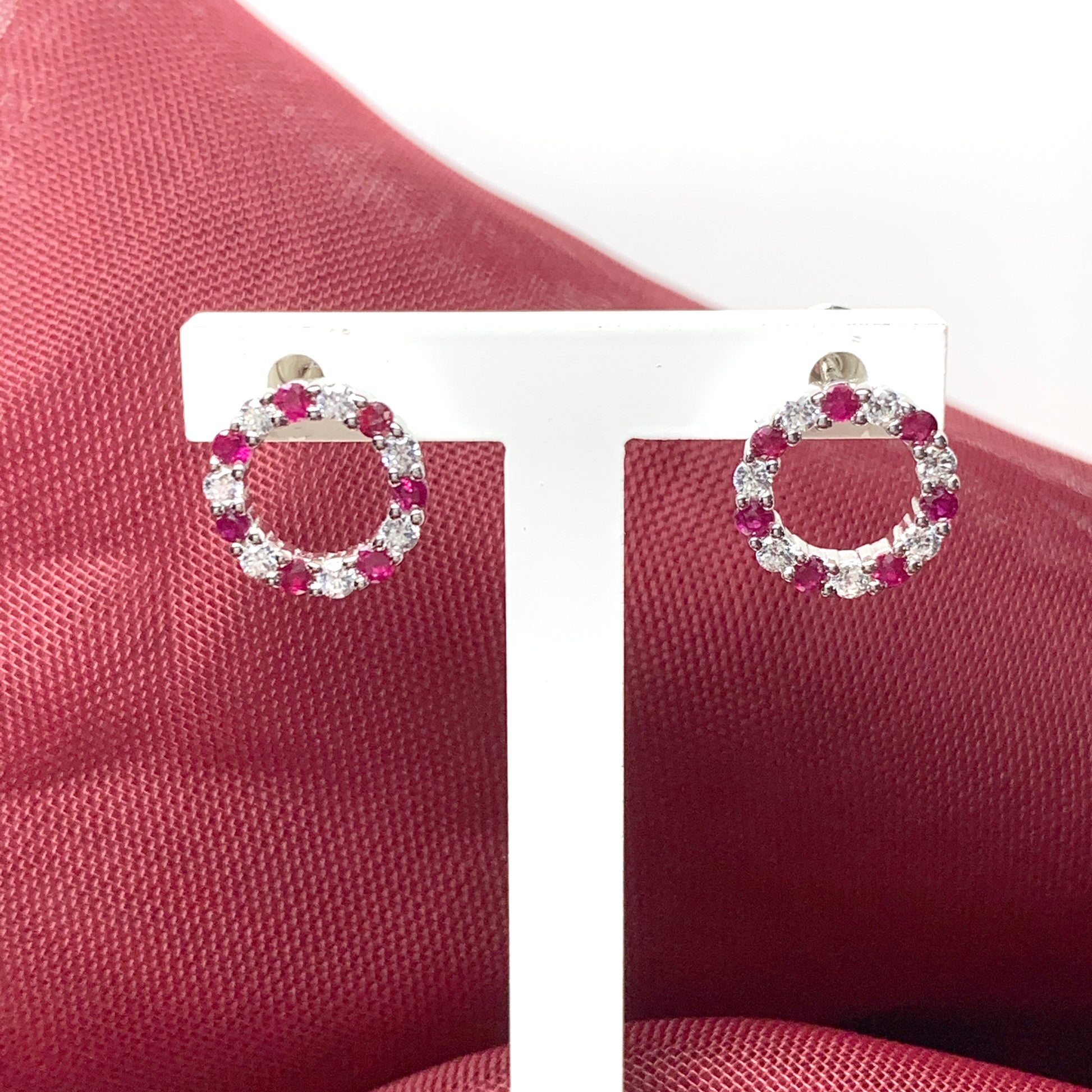Round red ruby and cubic zirconia sterling silver stud earrings