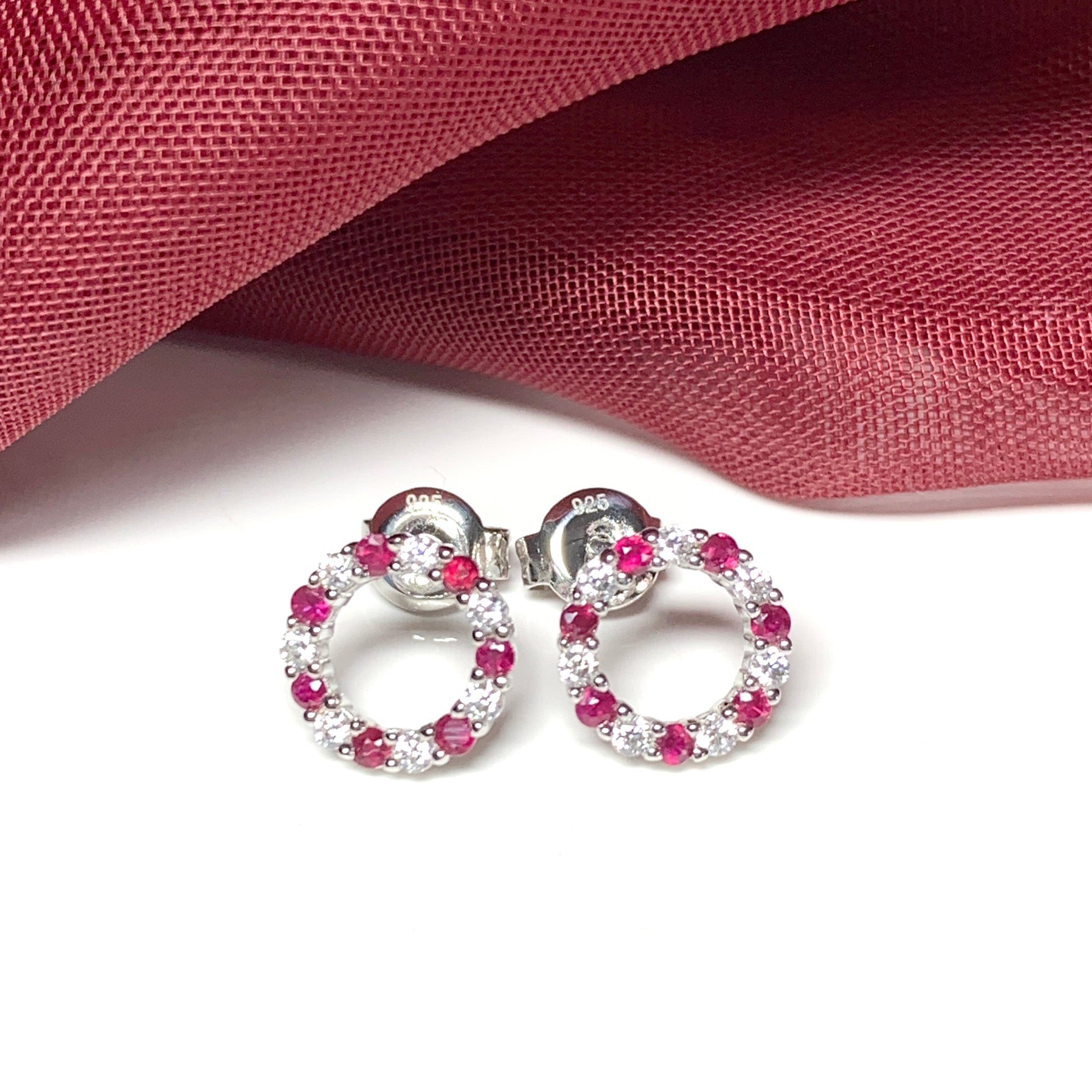 Round red ruby and cubic zirconia sterling silver stud earrings