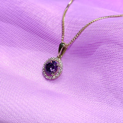 Round yellow gold and amethyst and cubic zirconia necklace pendent