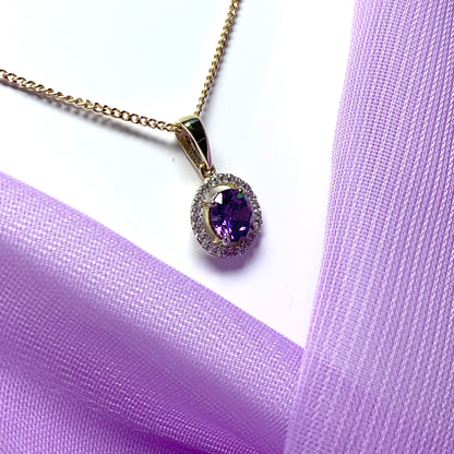 Round yellow gold and amethyst and cubic zirconia necklace pendent