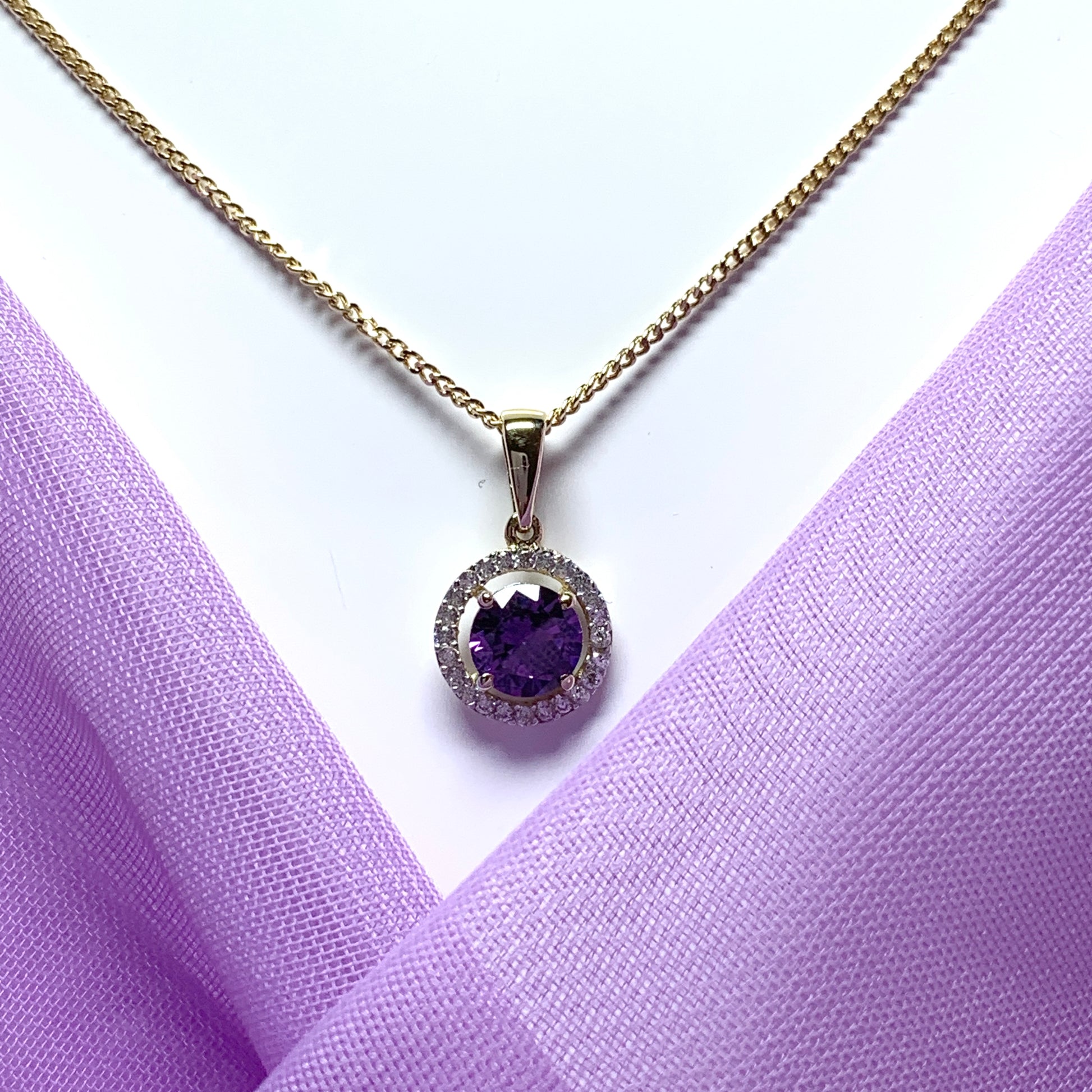 Round yellow gold and amethyst and cubic zirconia necklace pendent