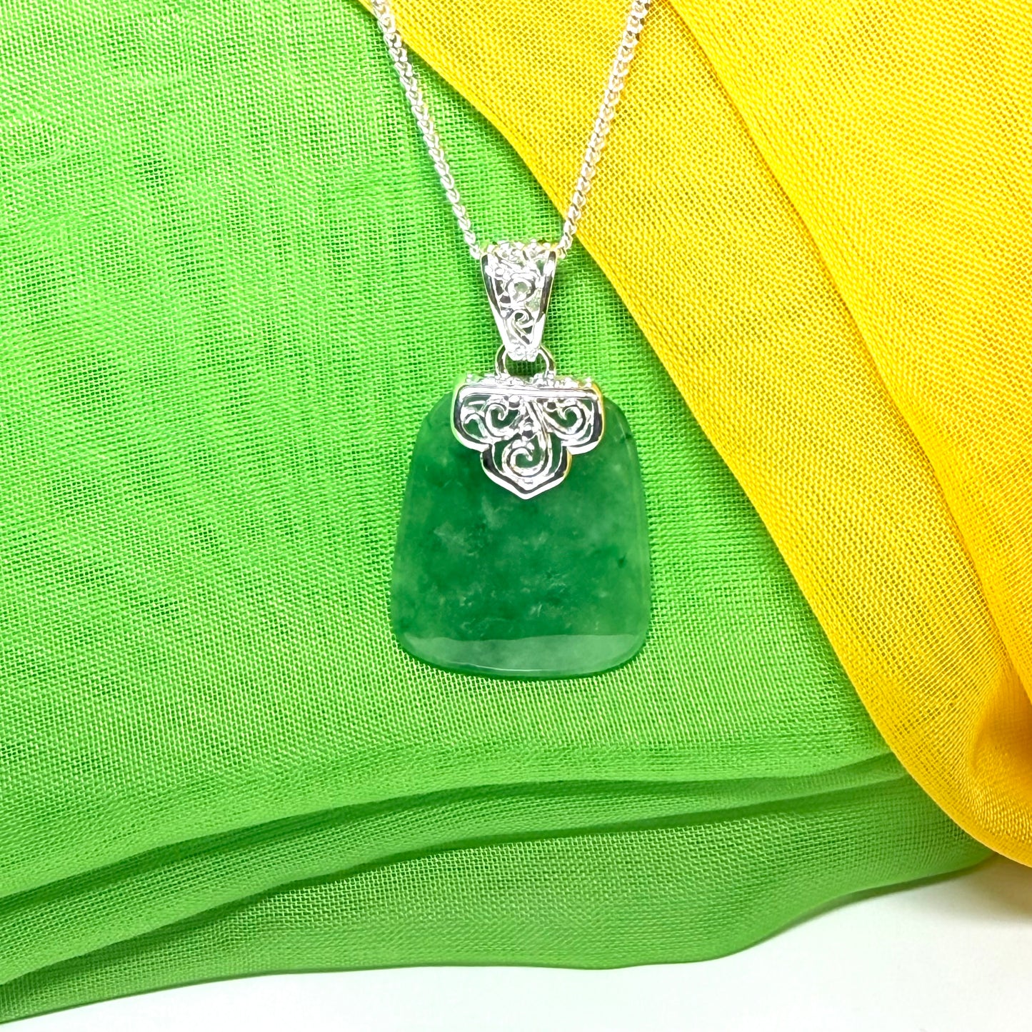 A real jade pendant green sterling silver large cushion shaped, a truly stunning necklace with a chain