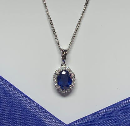 Real blue sapphire and diamond white gold cluster necklace oval pendant