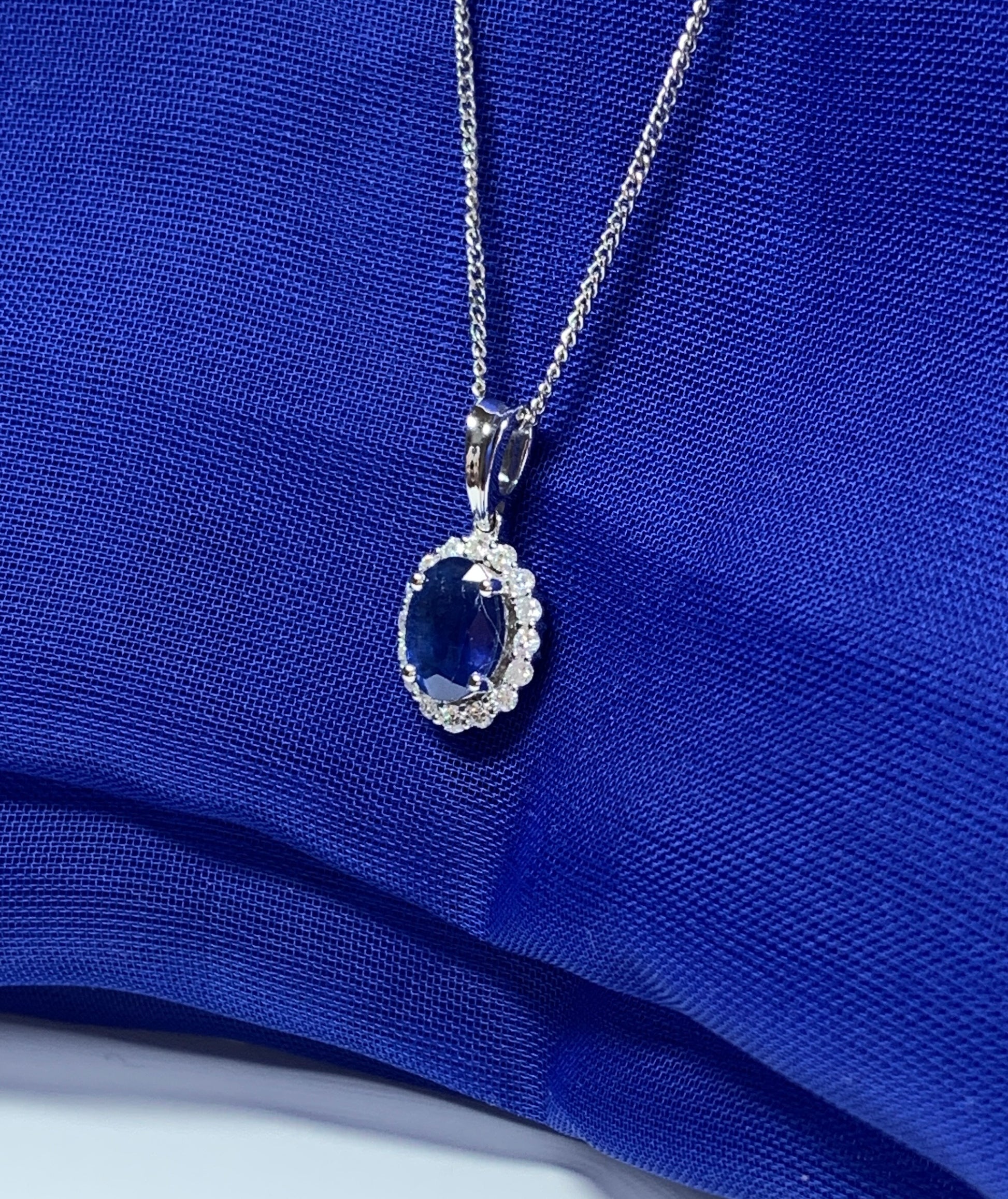 Real blue sapphire and diamond white gold cluster necklace oval pendant