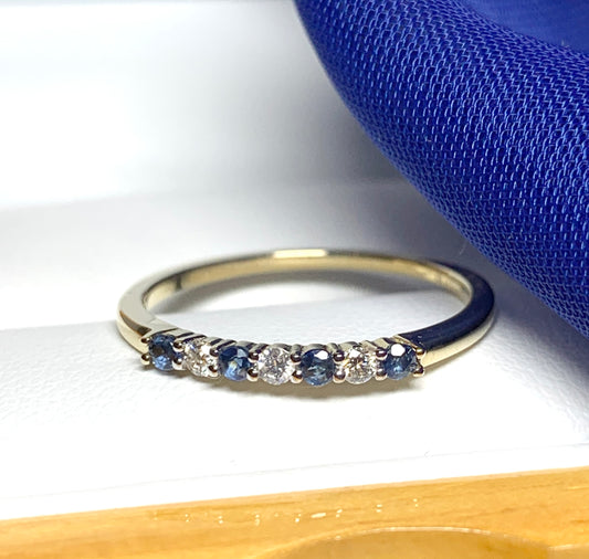 Blue Sapphire And Diamond Claw Set Eternity Ring