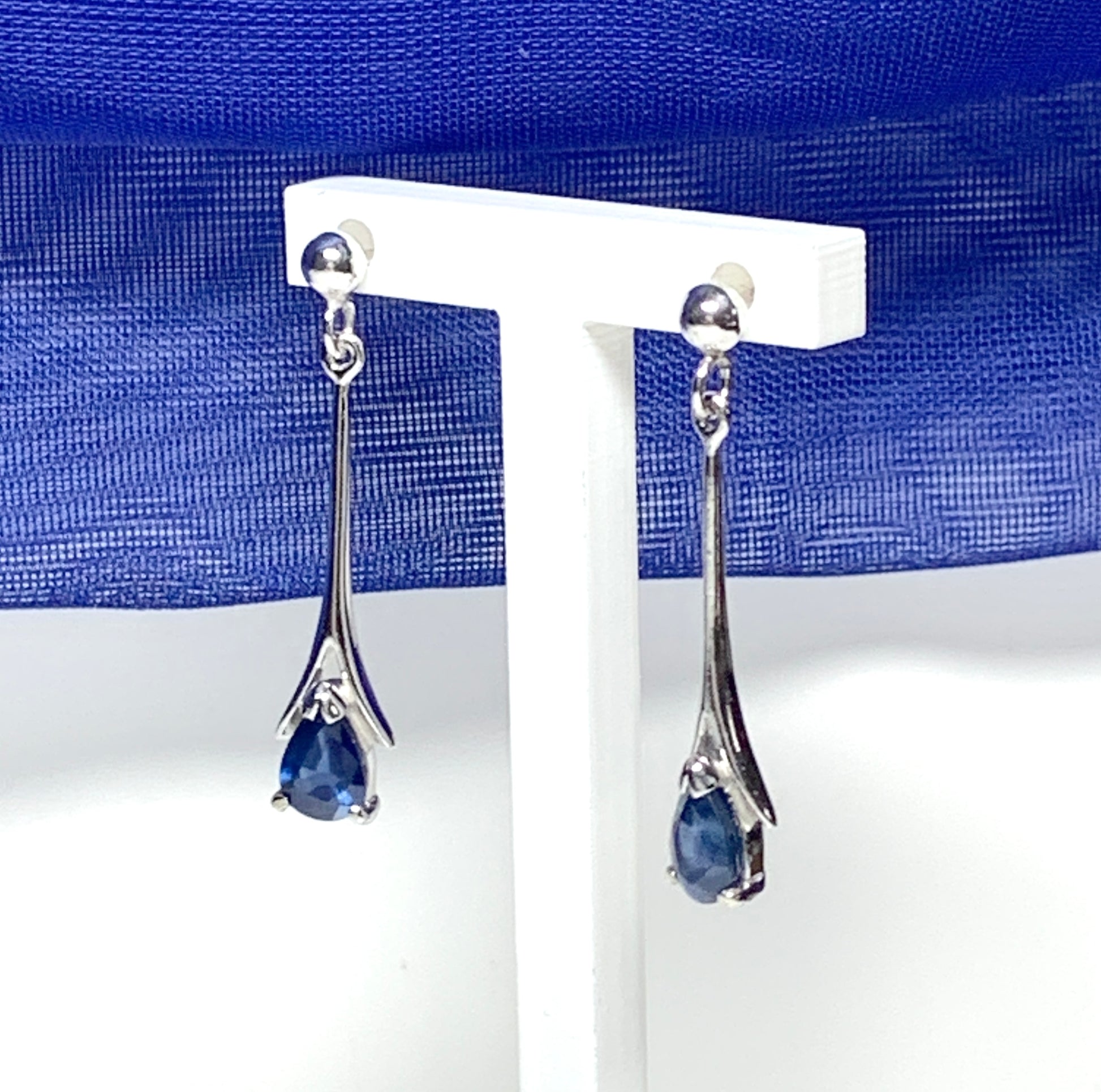 Sapphire white gold long drop earrings