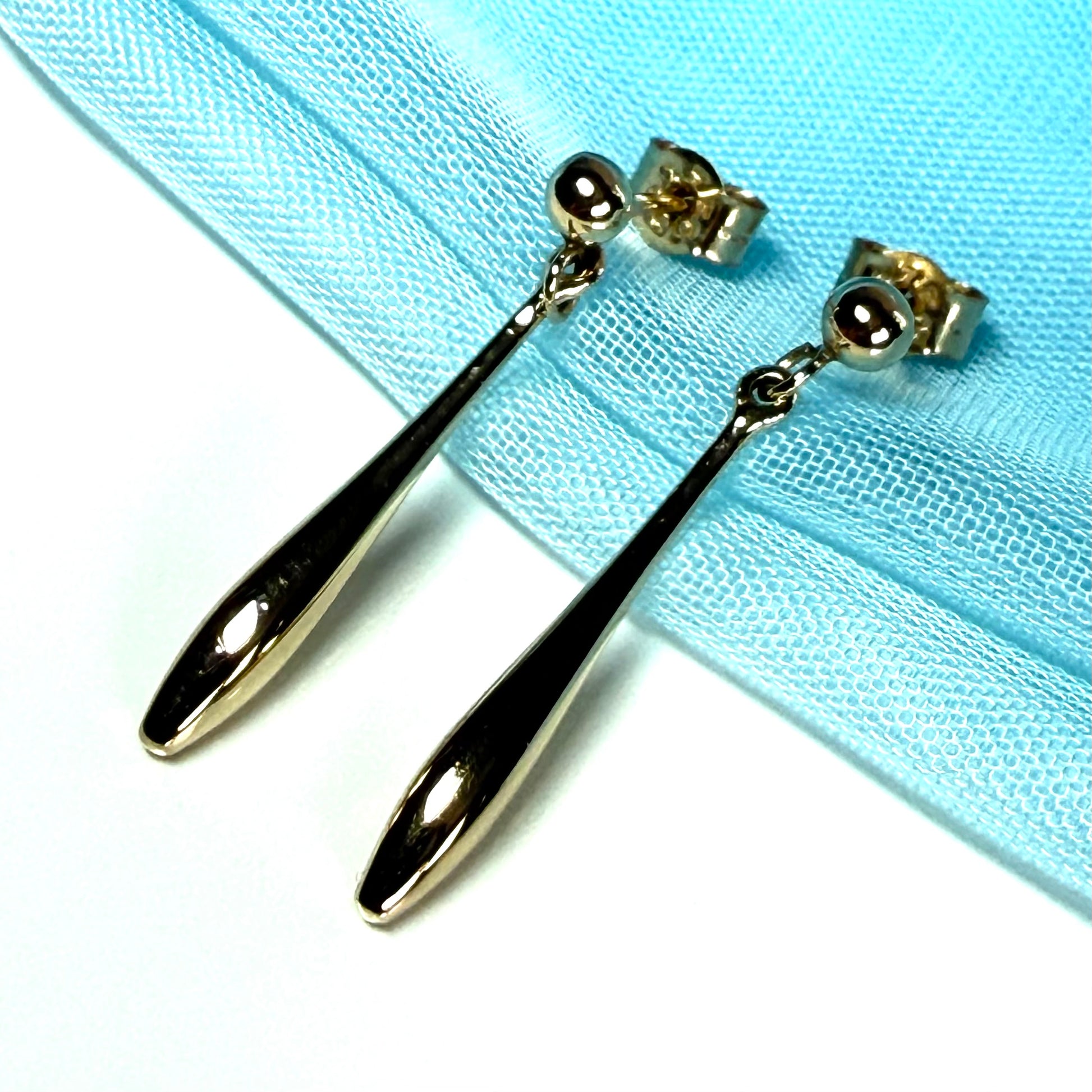 Sharp bomber shaped long teardrop gold drop earrings