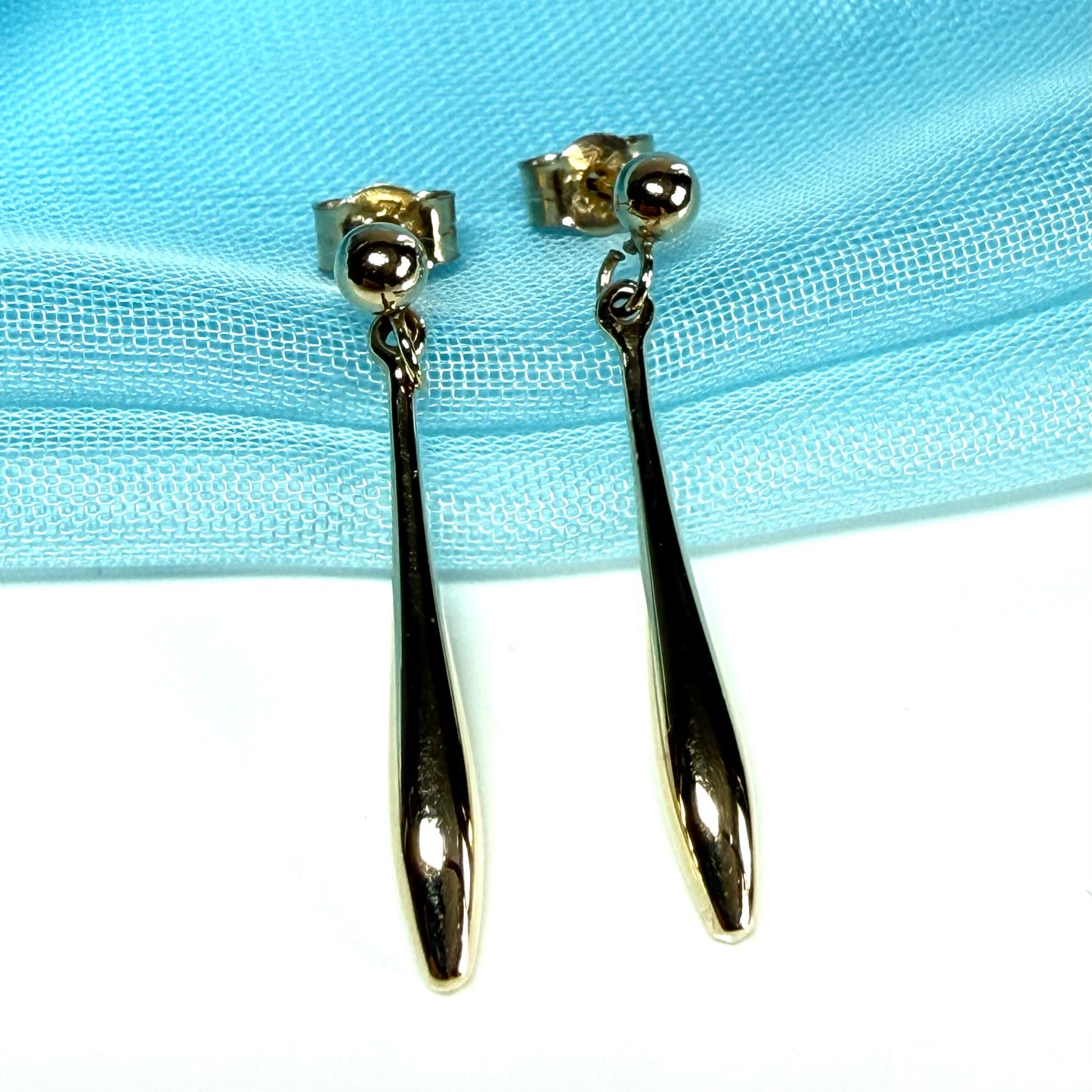 Sharp bomber shaped long teardrop gold drop earrings