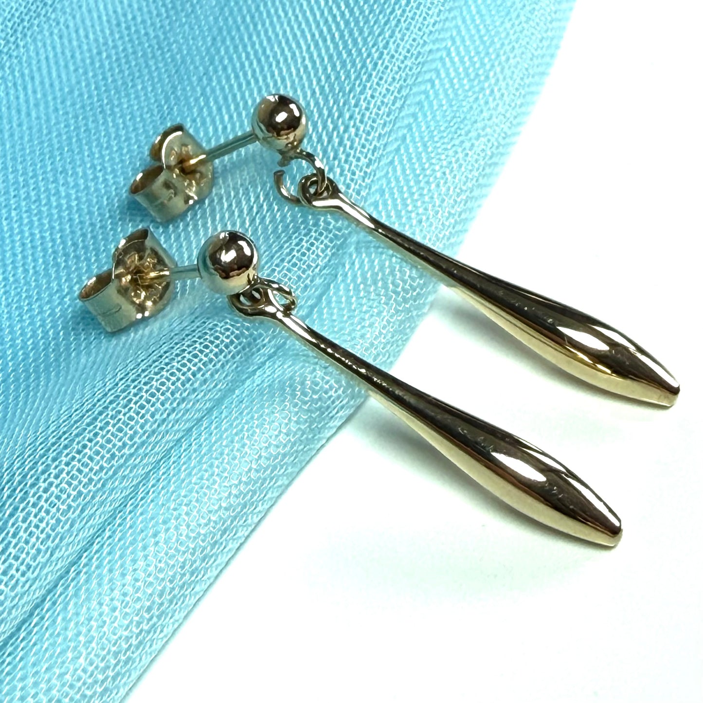 Sharp bomber shaped long teardrop gold drop earrings