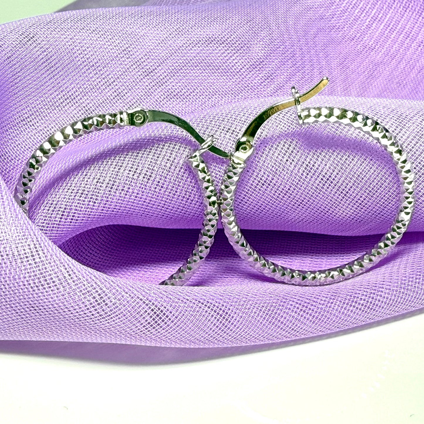 Silver hoop earrings diamond cut patterned