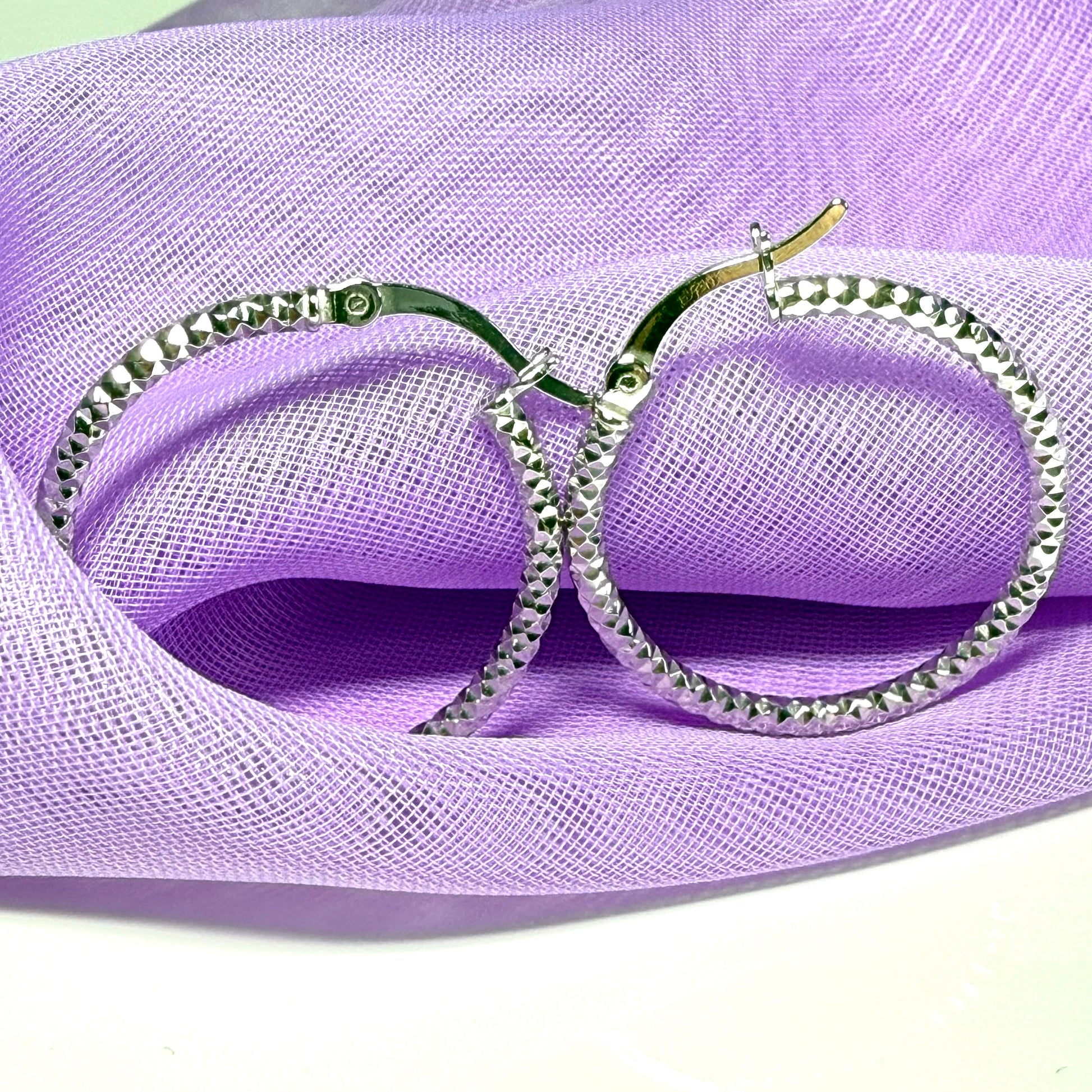 Silver hoop earrings diamond cut patterned