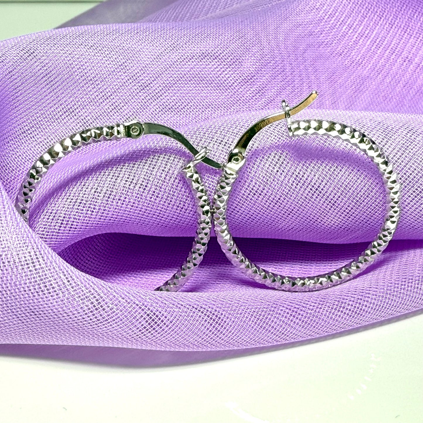 Silver hoop earrings diamond cut patterned