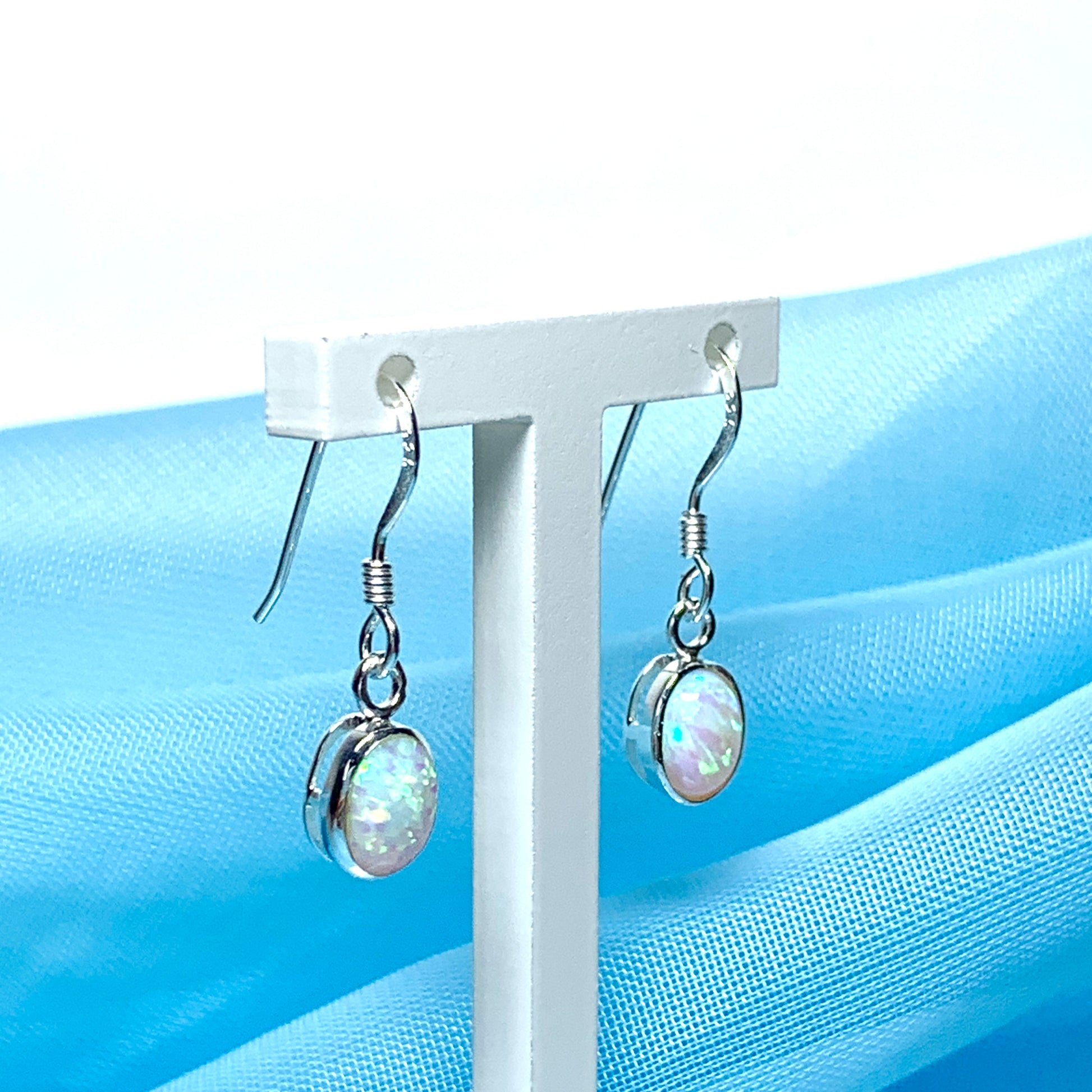 Oval sterling silver opal oval long drop earrings