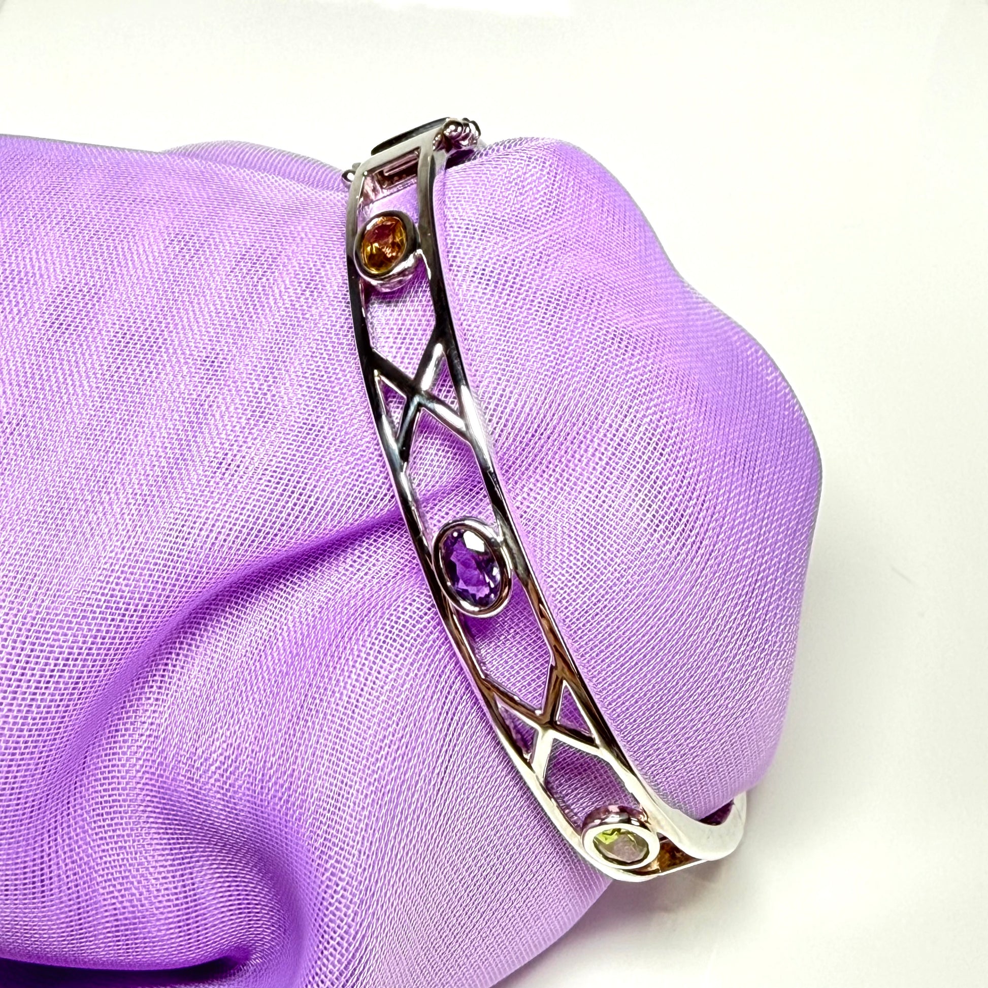 Sterling silver oval real peridot, real amethyst and real citrine, purple, green and yellow open pierced kiss bangle