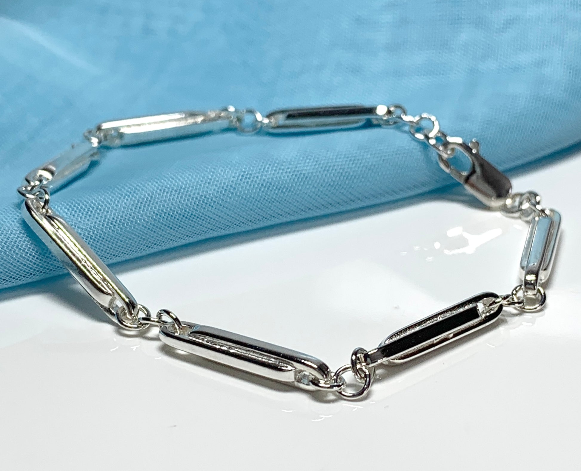 Ladies twisted sterling silver bracelet fancy patterned solid link