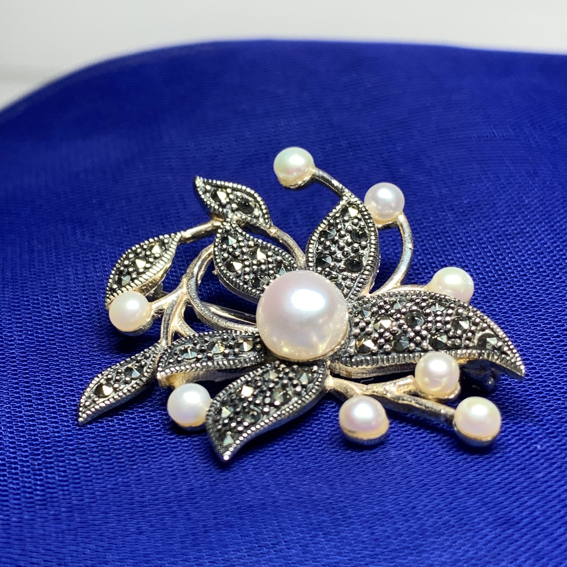 Sterling silver pearl and marcasite flower brooch