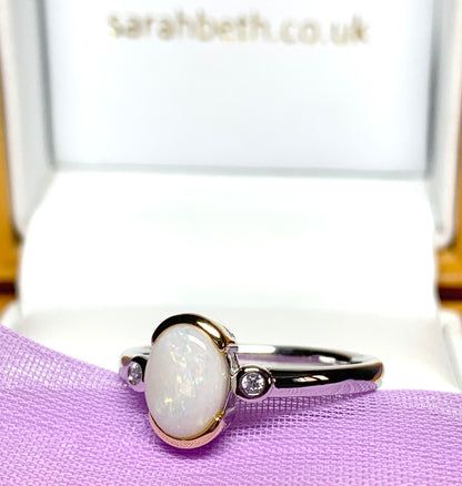 Sterling silver real opal oval and cubic zirconia ring