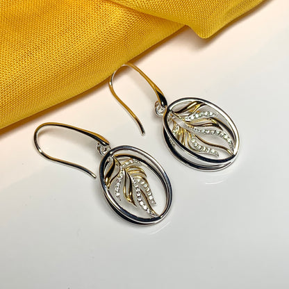 Sterling silver two tone oval drop earrings