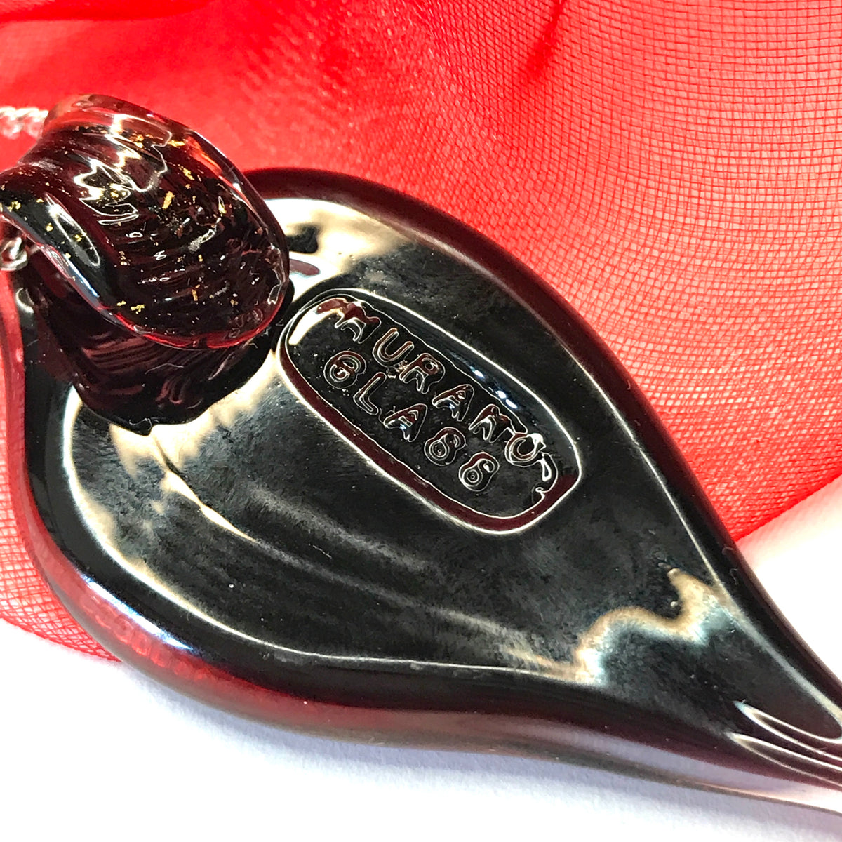 Small Red And Gold Coloured Real Murano Glass Leaf Shape Pendant With the Genuine Murano Glass stamp on the back of it