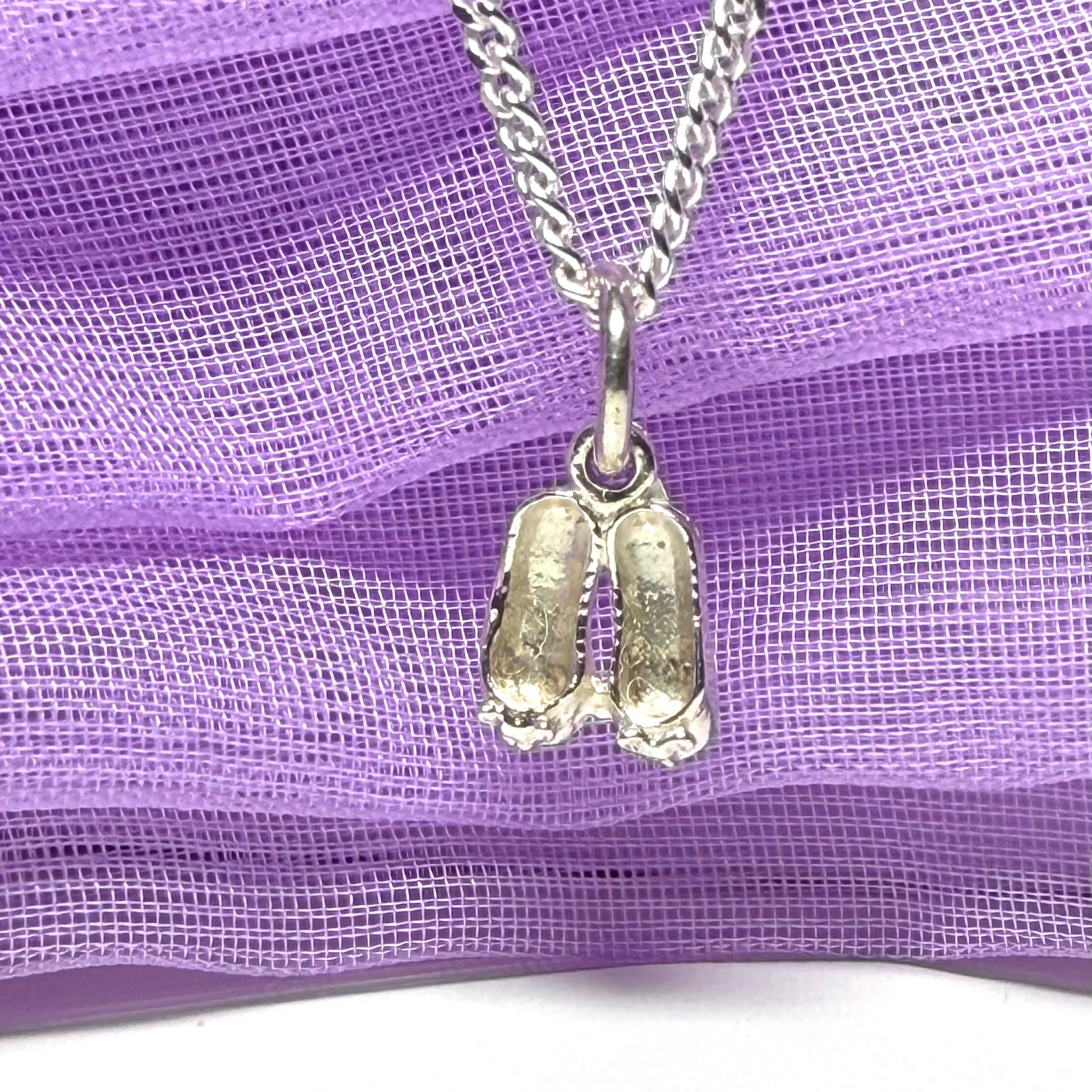 Small ballerina slippers shaped sterling silver necklace