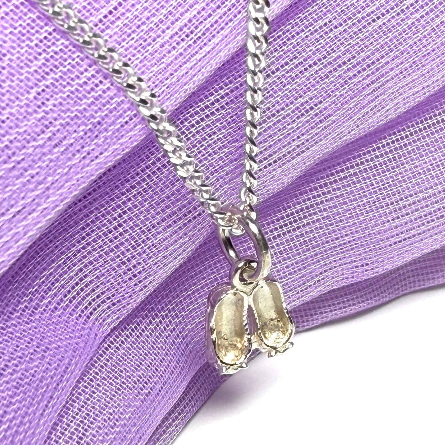 Small ballerina slippers shaped sterling silver necklace