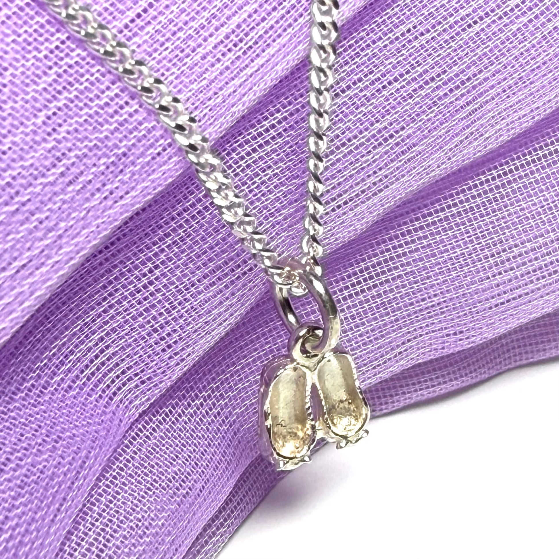Small ballerina slippers shaped sterling silver necklace