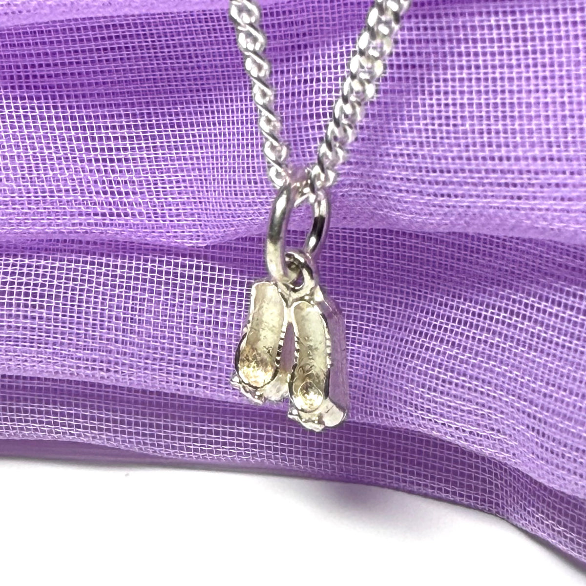 Small ballerina slippers shaped sterling silver necklace