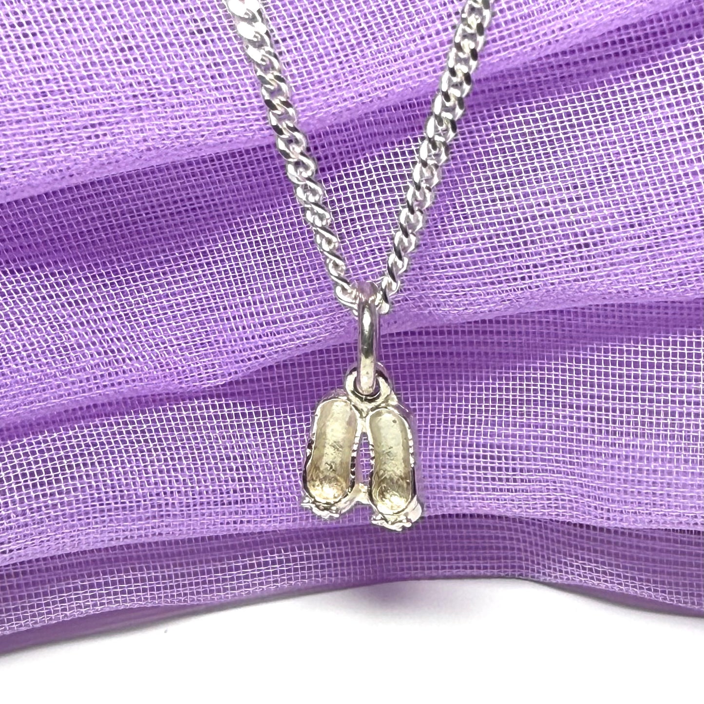 Small ballerina slippers shaped sterling silver necklace
