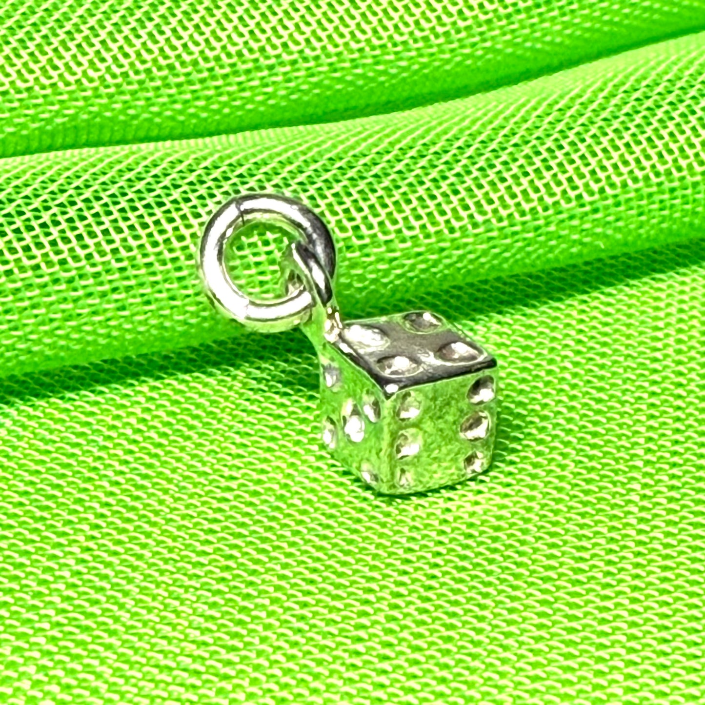 Small dice shaped sterling silver charm