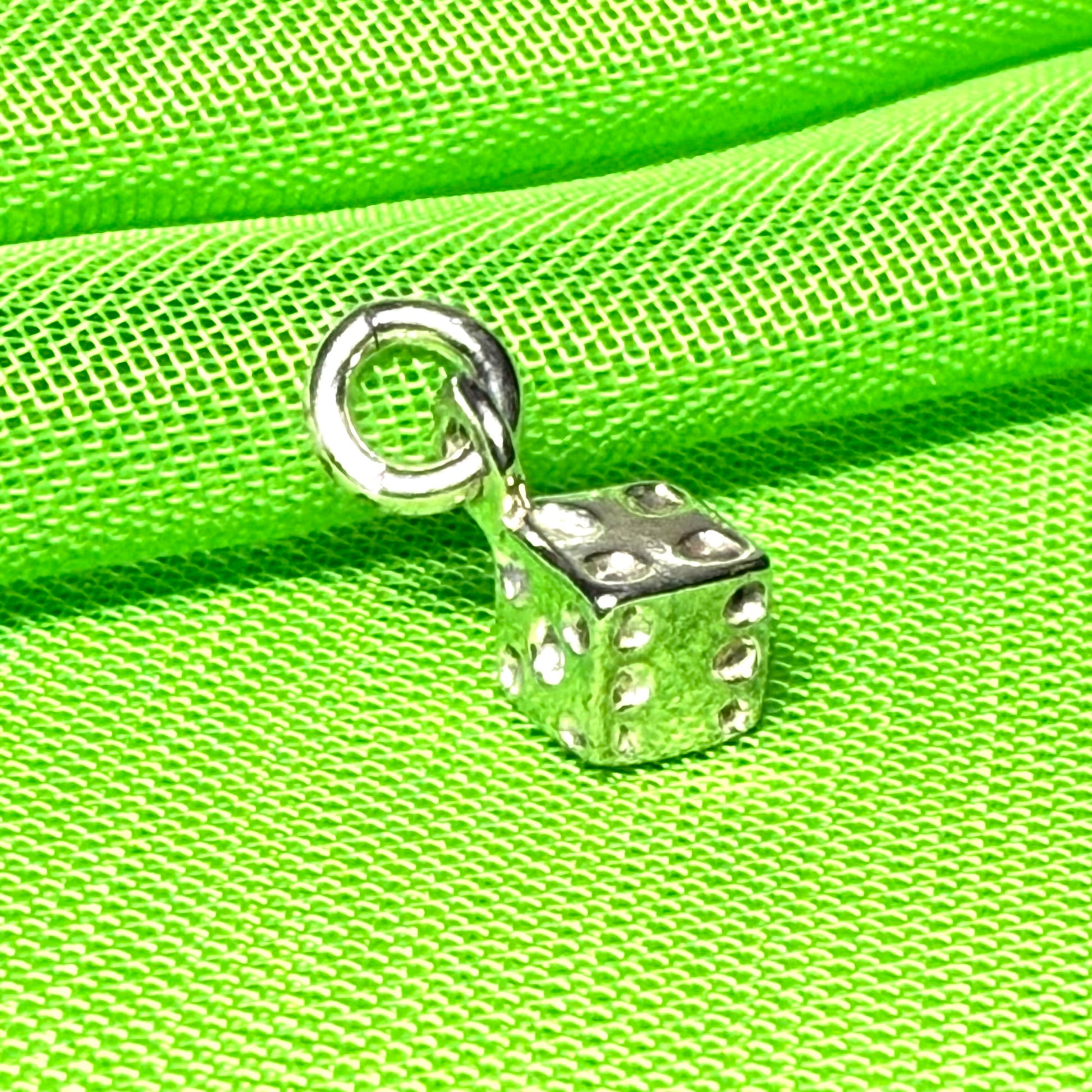 Small dice shaped sterling silver charm