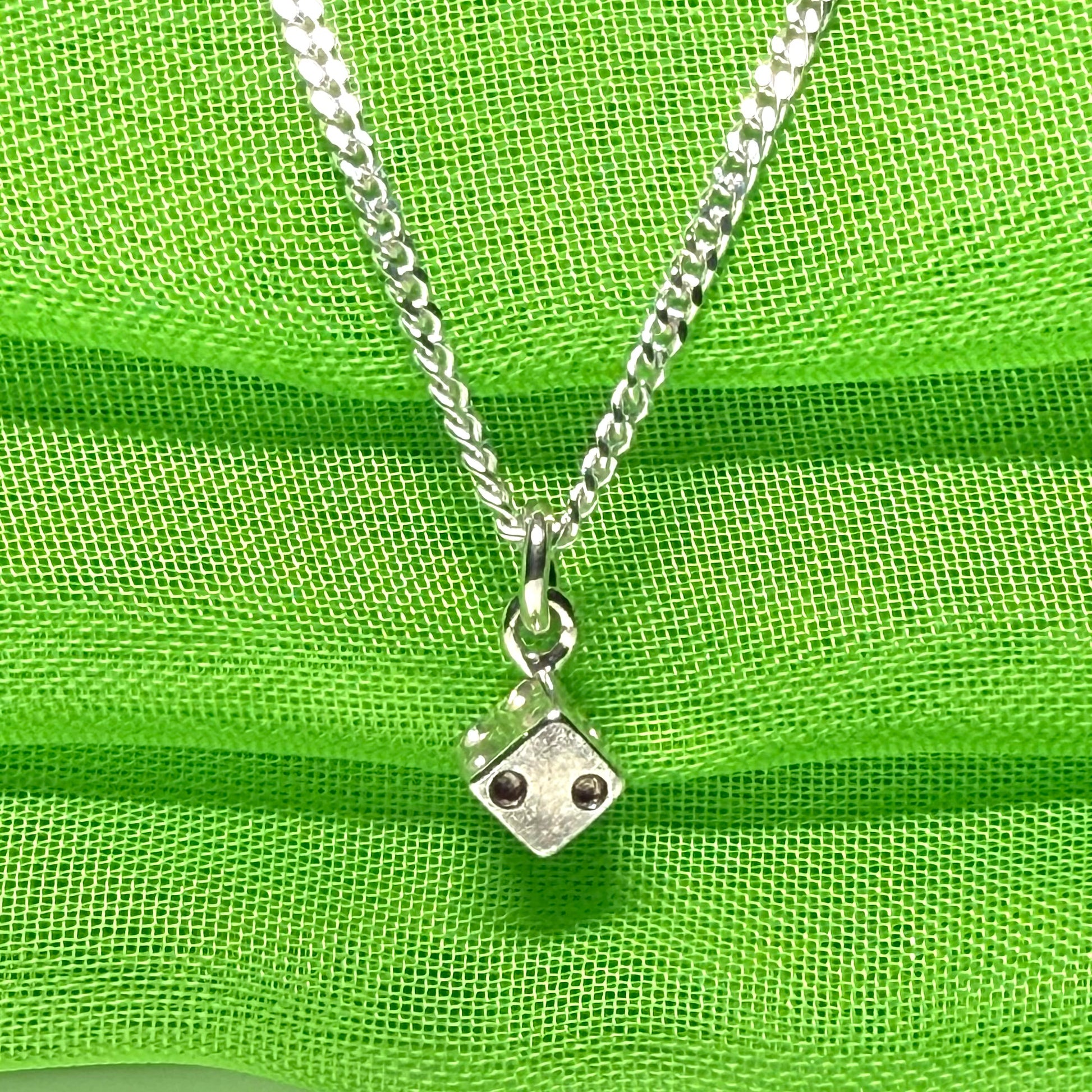 Small dice shaped sterling silver necklace