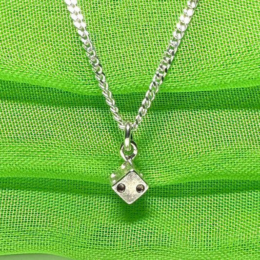 Small dice shaped sterling silver necklace