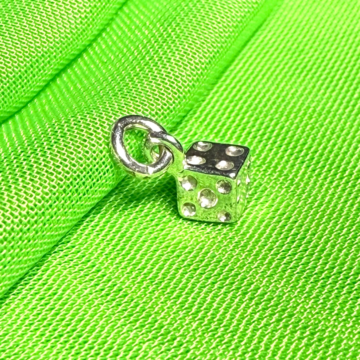 Small dice shaped sterling silver charm