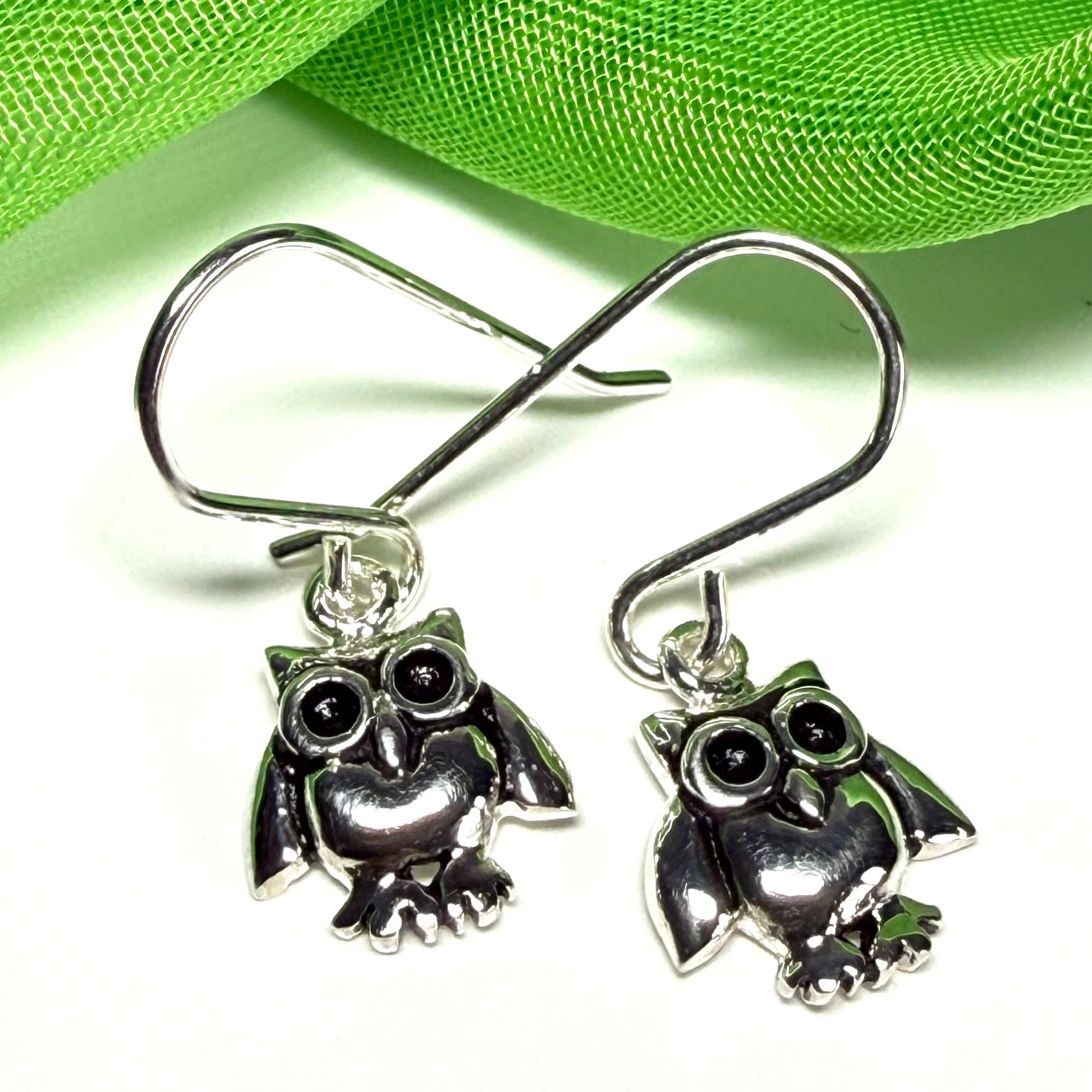 Small owl shaped drop earrings sterling silver