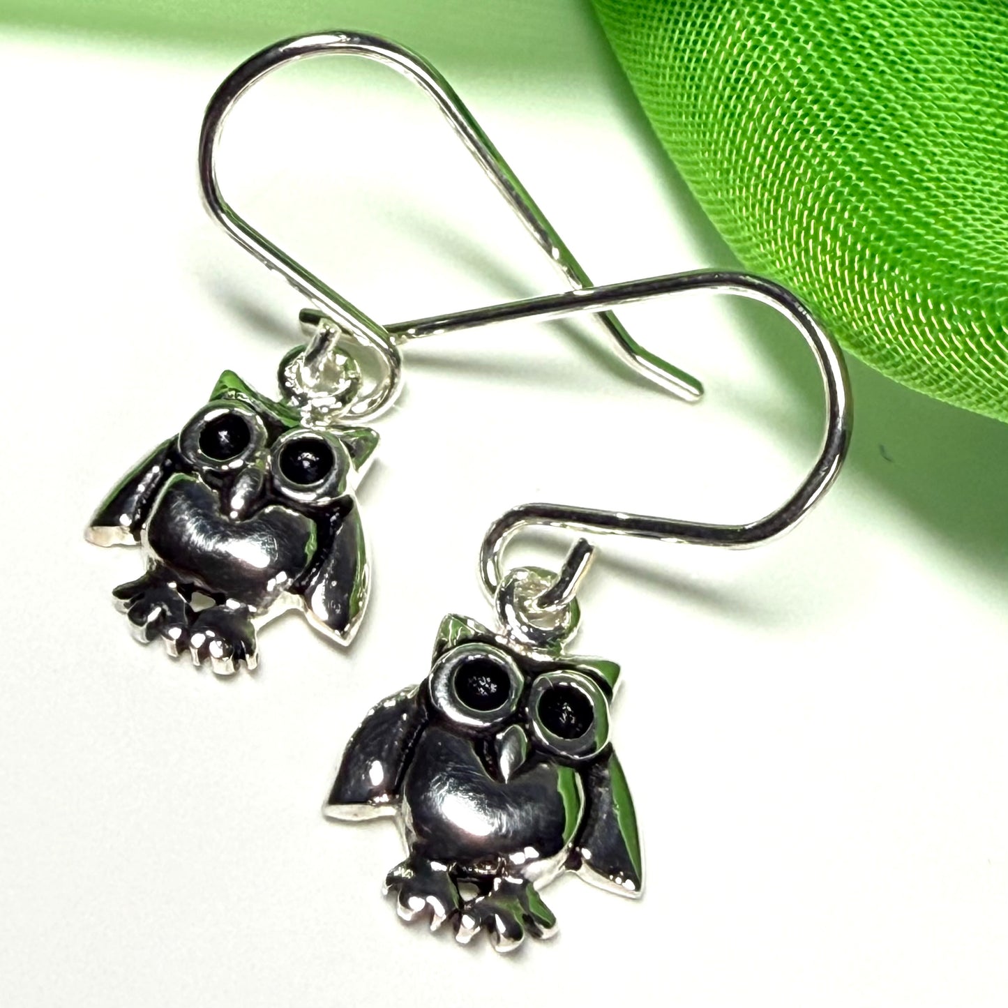 Small owl shaped drop earrings sterling silver