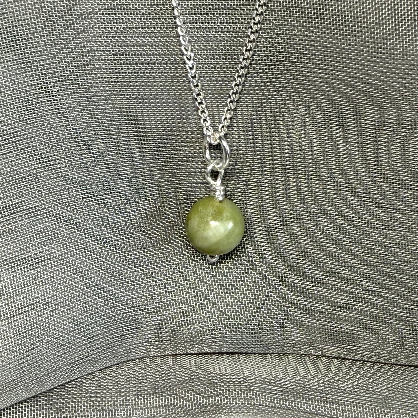 Small real green gypsum round necklace ball shape pendant with chain measuring 8.5 mm in diameter