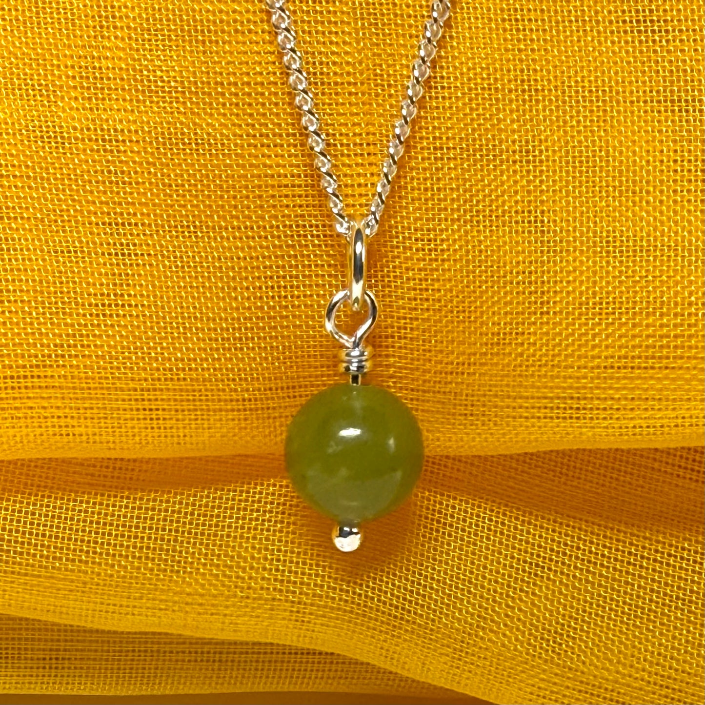 Small round real green gypsum necklace ball shape pendant with chain measuring 8.5 mm diameter