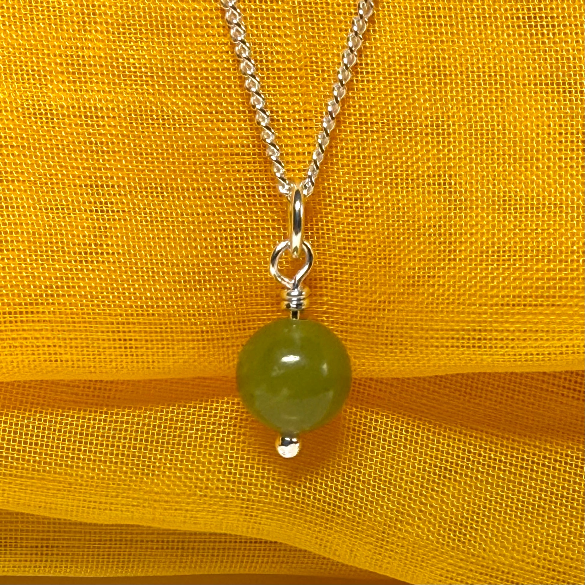 Small round real green gypsum necklace ball shape pendant with chain measuring 8.5 mm diameter
