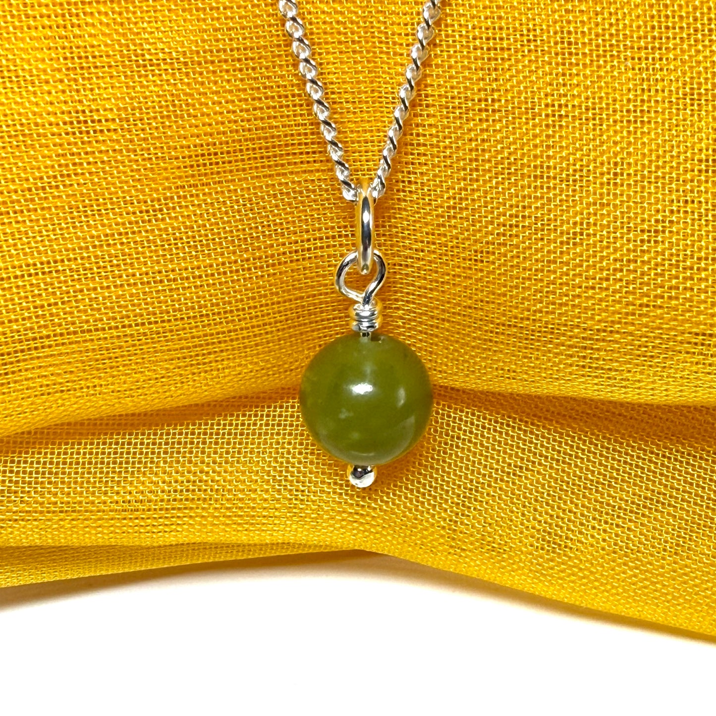 Small round real green gypsum necklace ball shape pendant with chain measuring 8.5 mm diameter