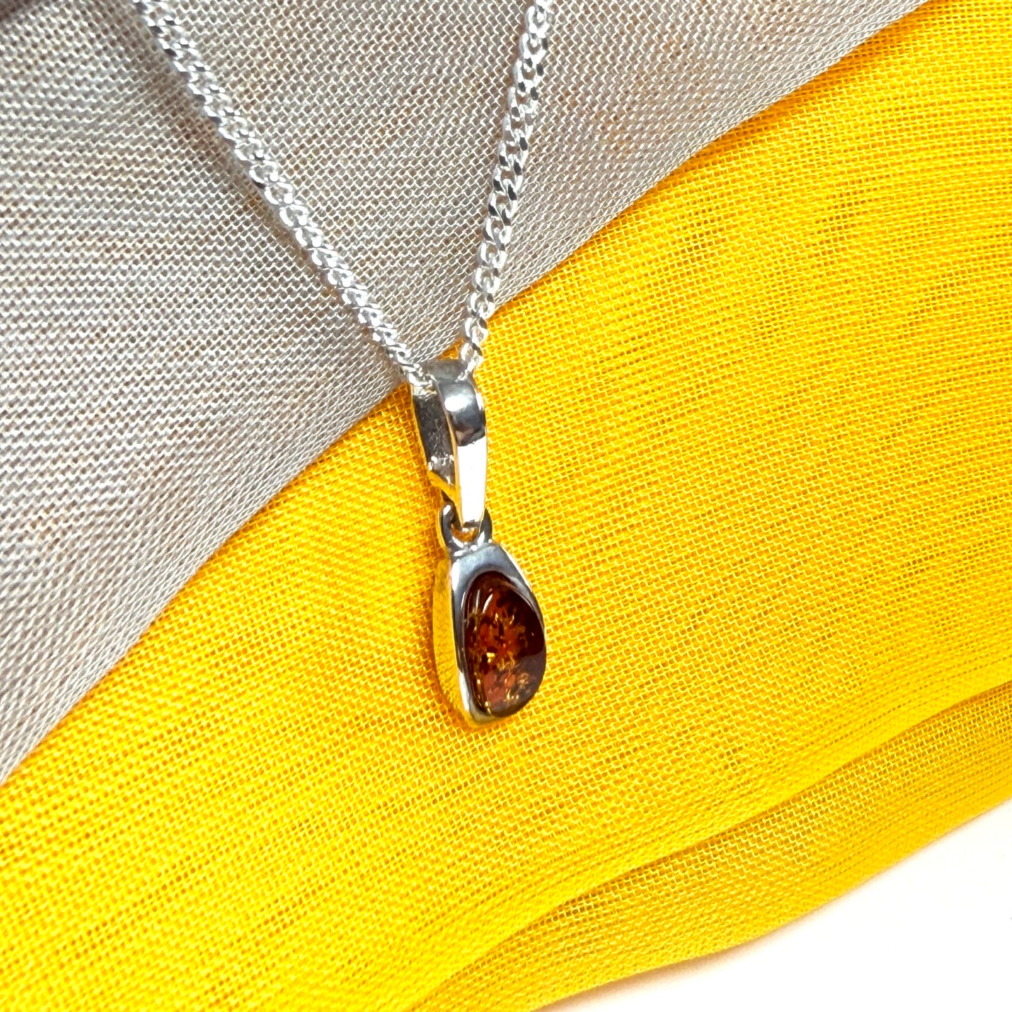 Small squared oval shaped real amber necklace pendant