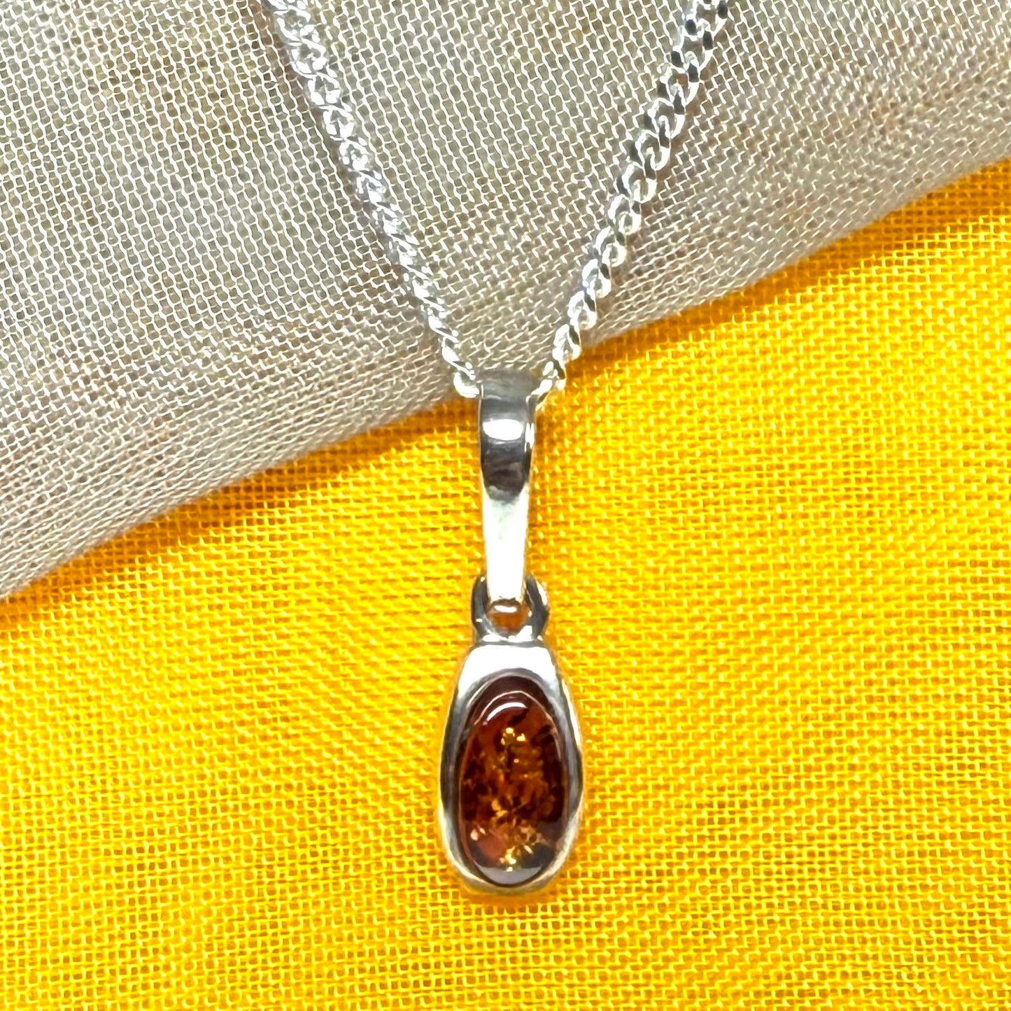 Small squared oval shaped real amber necklace pendant