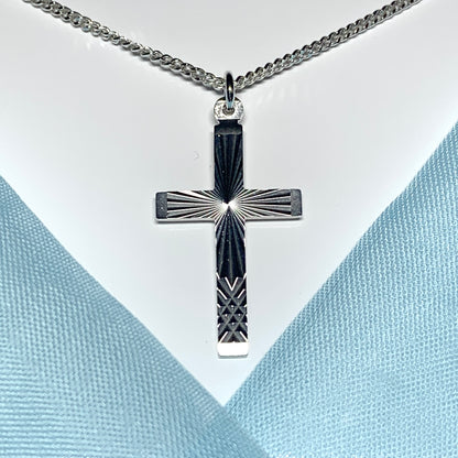 Solid cross patterned sterling silver diamond cut including chain