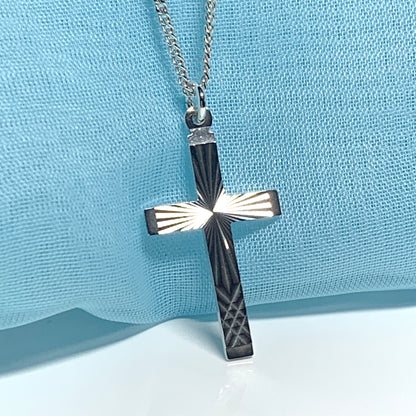 Solid cross patterned sterling silver diamond cut including chain