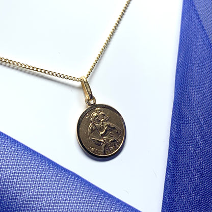 Solid round St. Christopher yellow gold